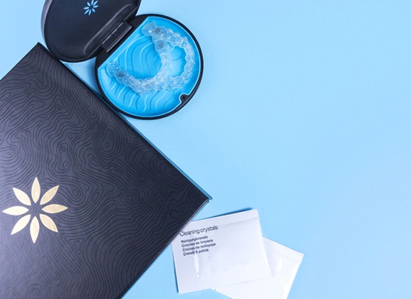 Invisalign welcome kit with aligners and a protective case