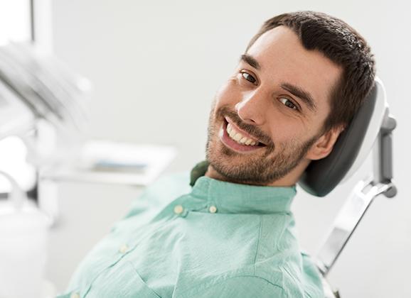 Man smiling during dental checkup