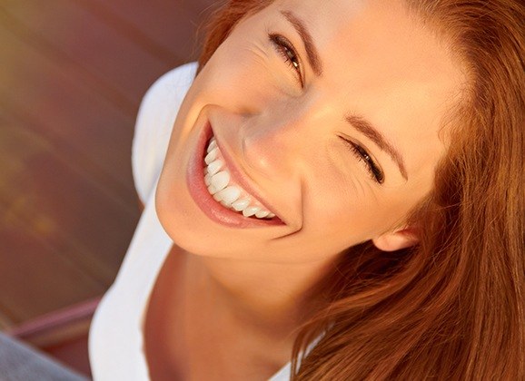 Patient smiling after fluoride treatment