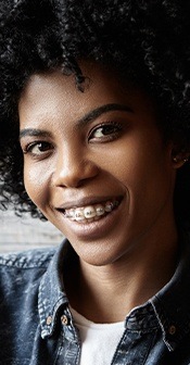 Young woman with traditional braces