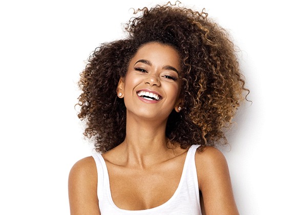 Smiling woman with tooth-colored fillings in Brooklyn