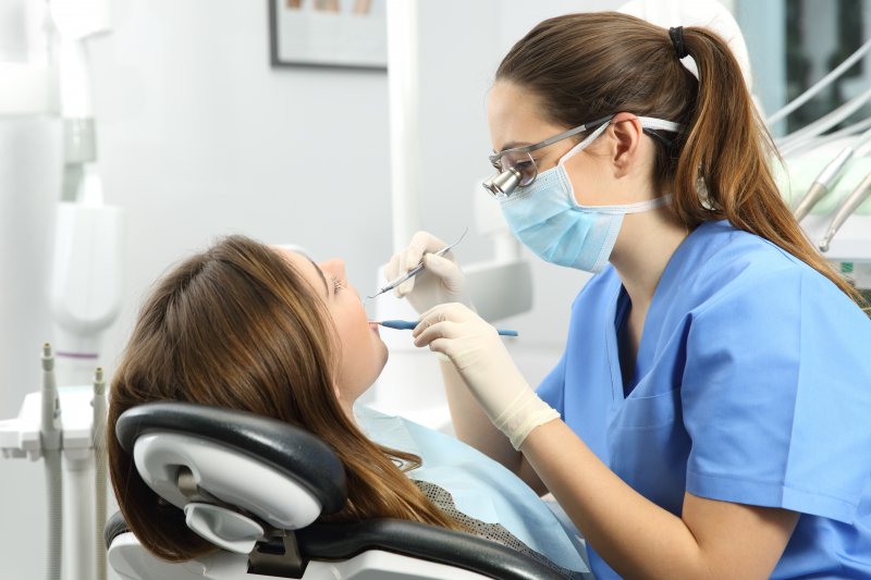 Woman at dentist in Brooklyn