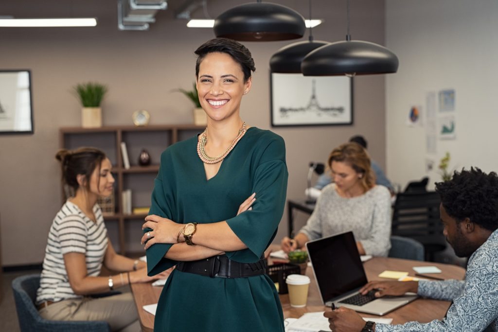 Female business professional smiling with white, straight teeth