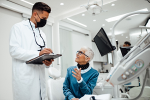 a patient attending their dental implant consultation 