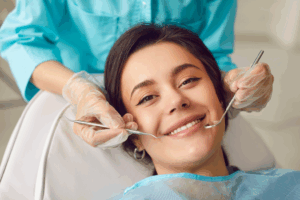 a patient smiling during a dental checkup